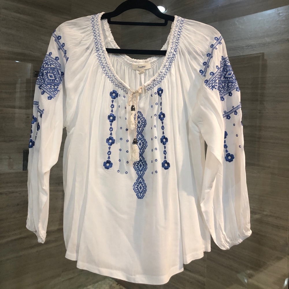White blouse with blue